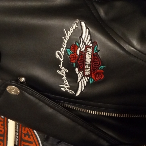 Childs size small Harley Jacket. Has zippers and a cute front tie. Like new - Picture 2 of 4
